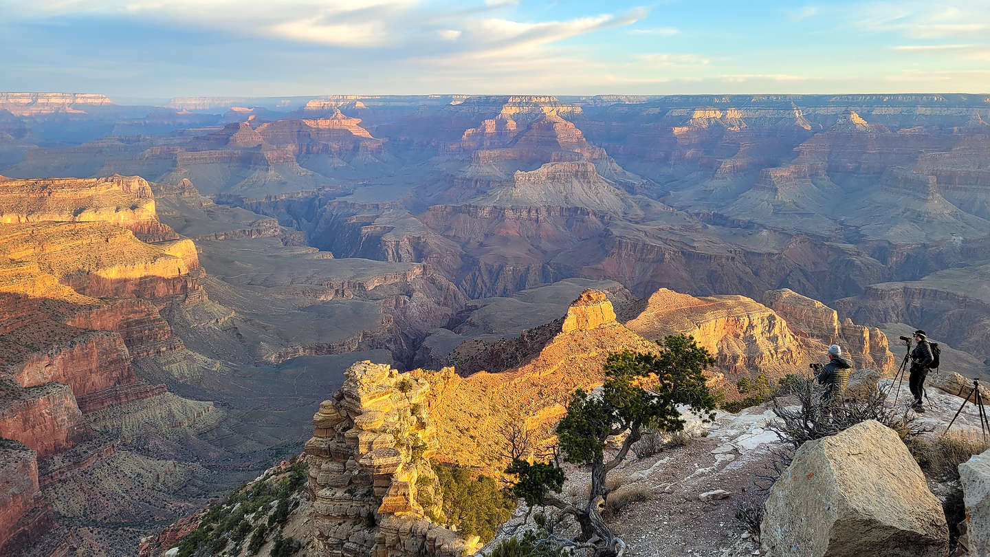 Herb and tripod photographing Sunrise at Yaki Point