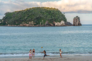 Sunset walk along Hahei Beach