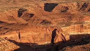 David and Goliath battle on the sandstone cliffs