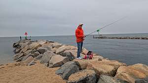 Herb fishing on Lobsterville Jetty