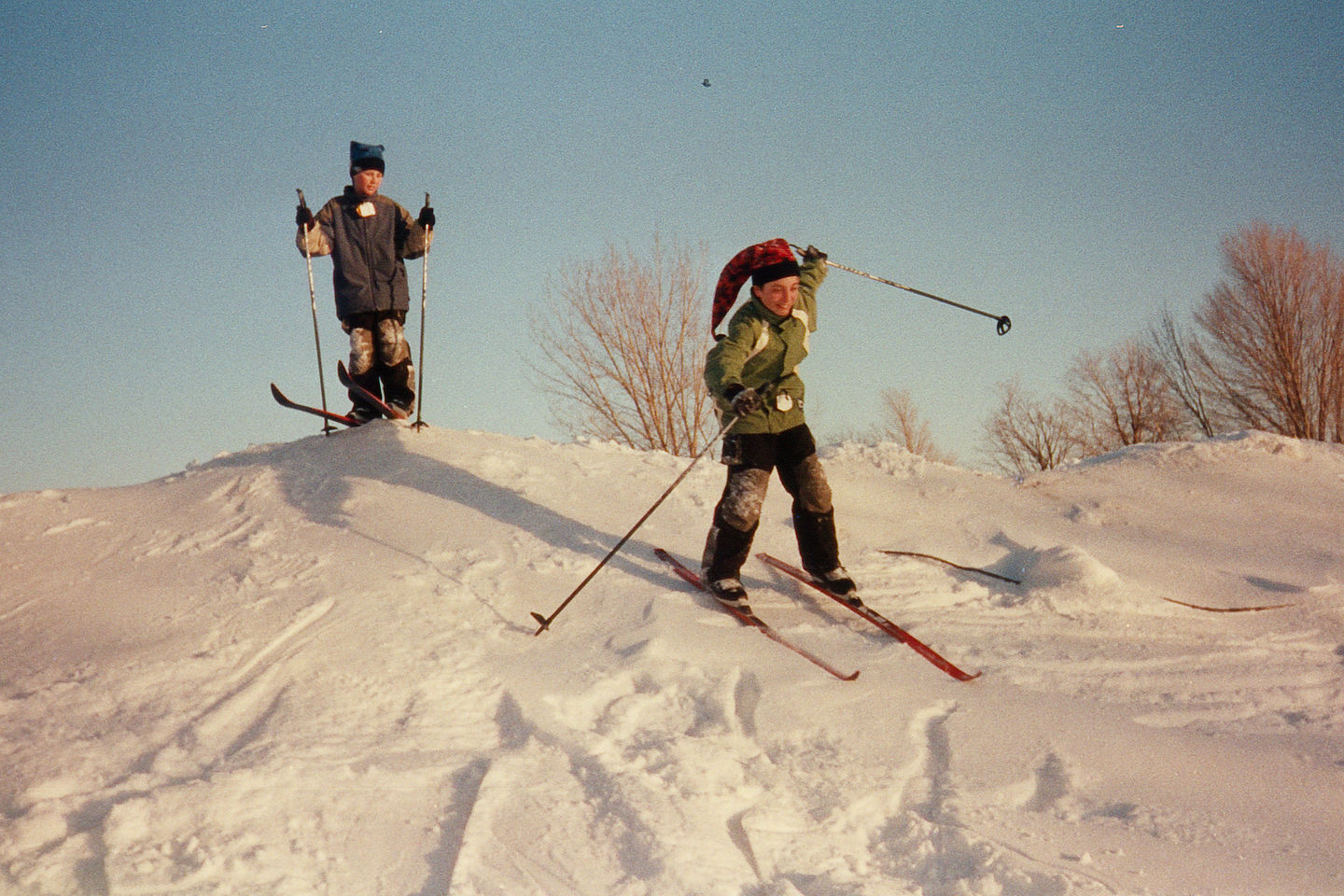 Boys XC skiing off-trail Boys XC skiing off-trail